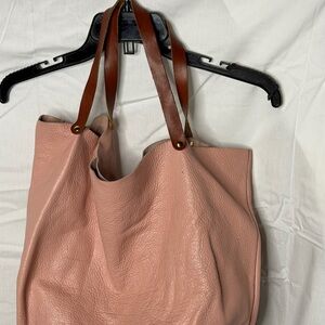 Pink leather slouchy tote.